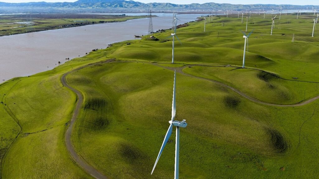 A drone view of windmills near the Sacramento River where it enters the California Delta near Rio Vista, California, U.S. December 28, 2025. REUTERS/Fred Greaves