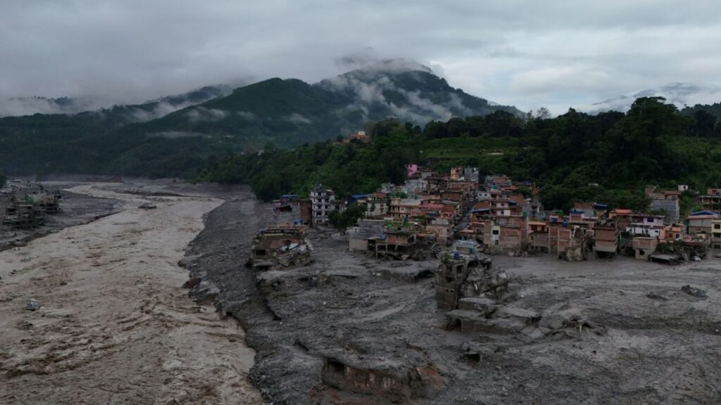 A drone view shows mud covering properties following a flash flood in Trishuli, Nuwakot district, Nepal, August 27, 2026. REUTERS/Navesh Chitrakar