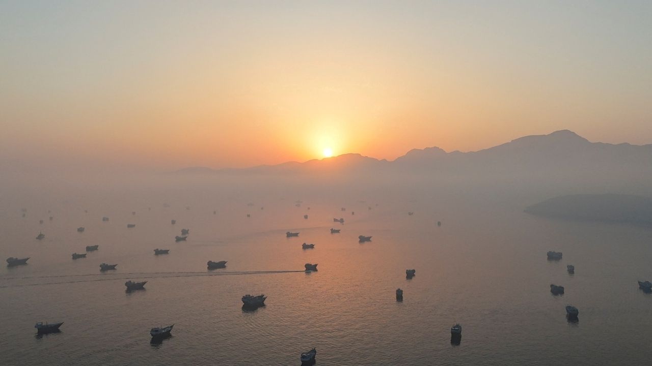 A drone view shows vessels in the Strait of Hormuz, as seen from Musandam, Oman, June 15, 2026. (Reuters File)