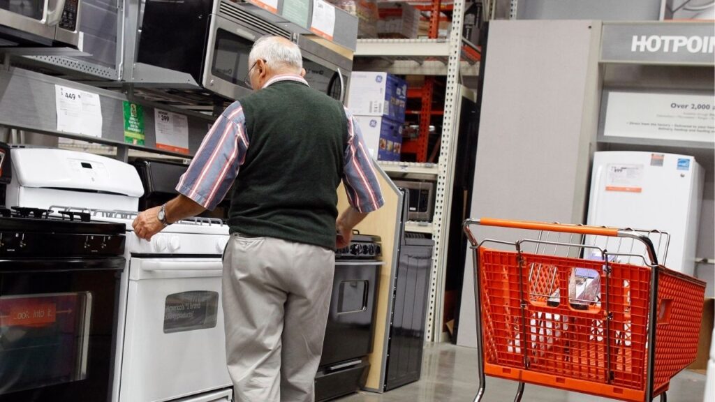 A man shops for an oven at a Home Depot store in New York July 29, 2010. (Reuters/Shannon Stapleton)