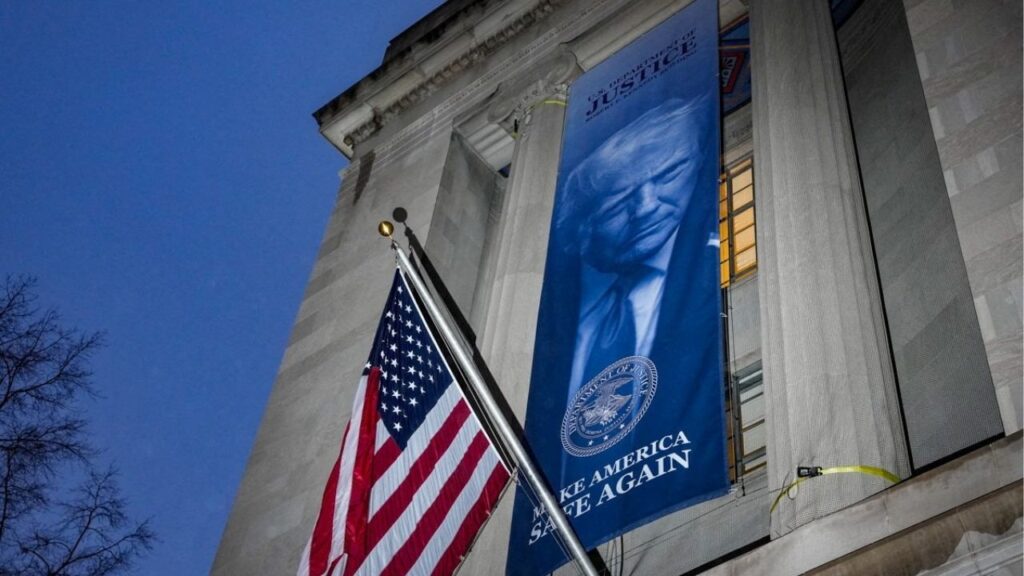 A new banner depicting U.S. President Donald Trump is put up on the Department of Justice building in Washington, D.C., U.S., February 20, 2026. (Reuters File)