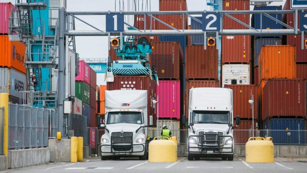 A shipping container is taken off a truck at the Port of Virginia in Norfolk, Va., Aug. 13, 2024. The cost of the fuel, used in farm machinery, trucks and other heavy equipment, has surged because of the war in Iran and Ukrainian attacks on Russian refineries. (Kristen Zeis/The New York Times)