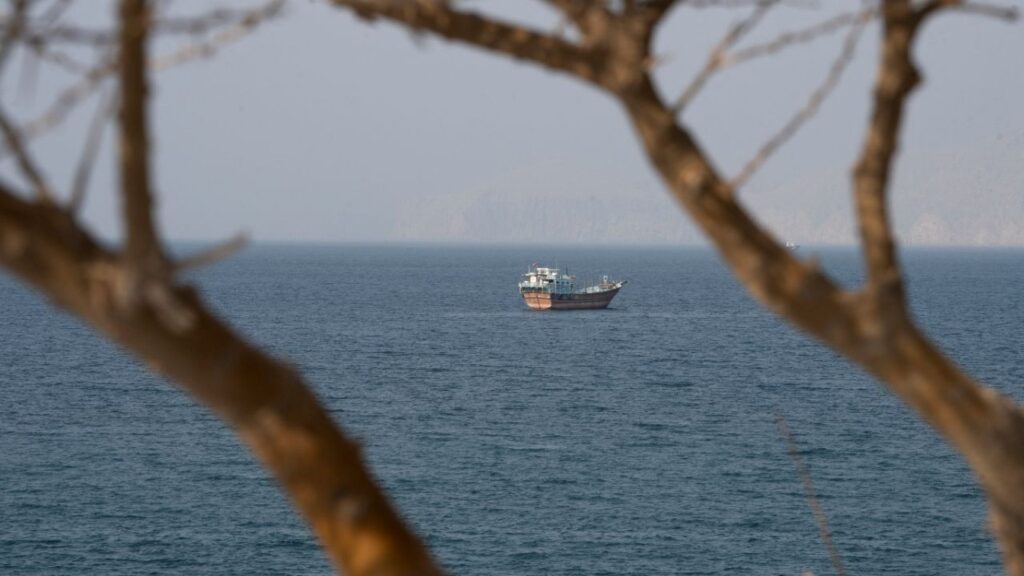 A vessel near the Strait of Hormuz, as seen from Musandam, Oman, August 17, 2026. (Reuters Stringer)