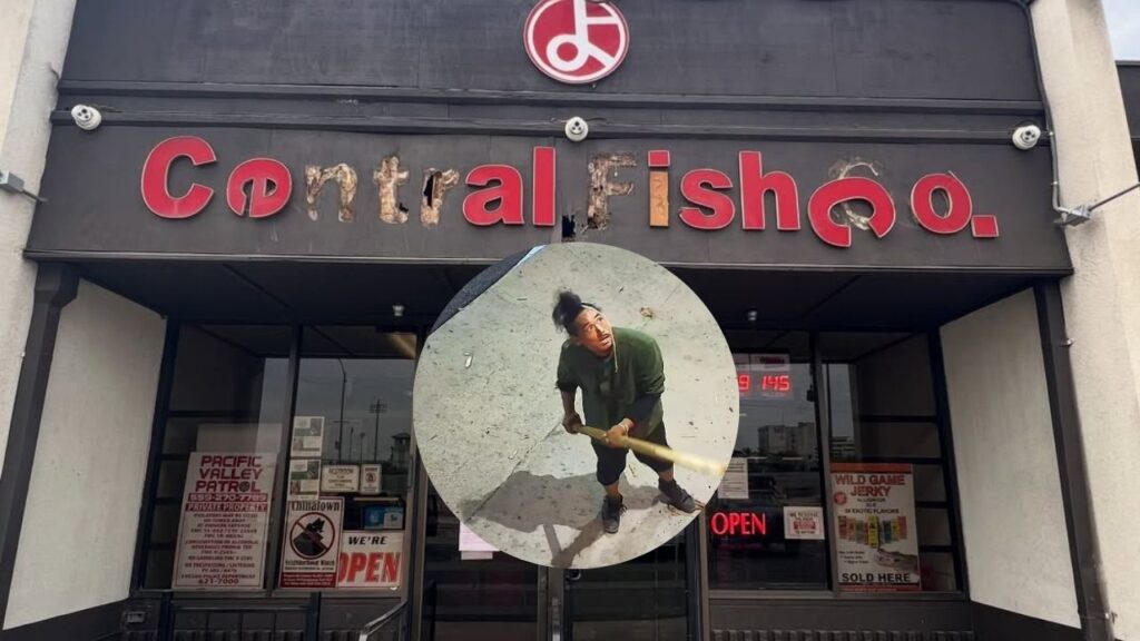 Central Fish Company said a citizen’s arrest was made after surveillance video showed a man striking its Chinatown building with a large stick and damaging its sign. (GV Wire Composite)