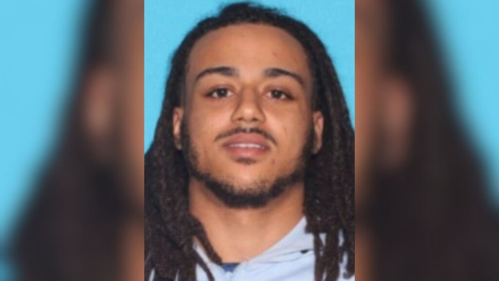 Elijah Brown, 24, was arrested early after police said he violated a domestic violence restraining order and tried to hide from officers in a dumpster. (Fresno PD)