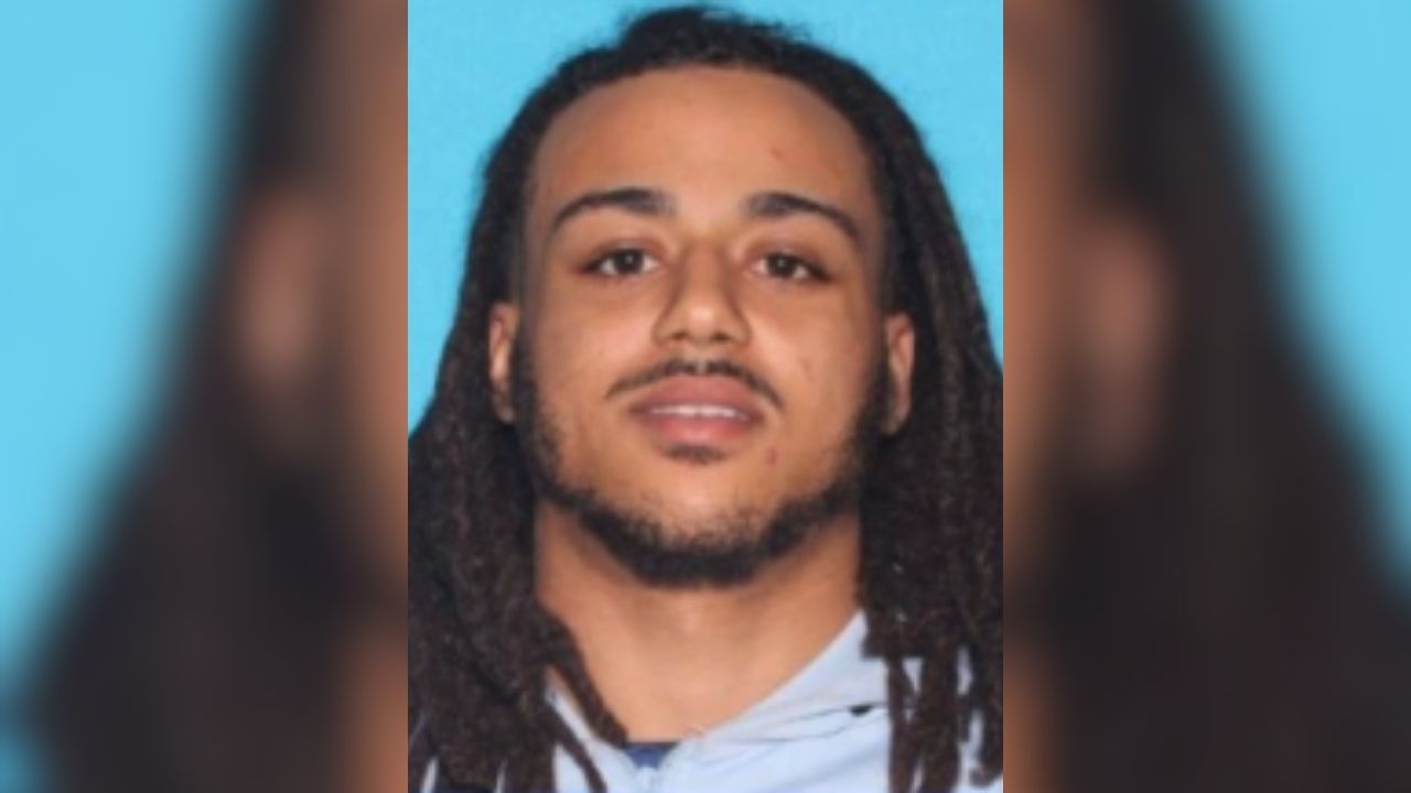 Elijah Brown, 24, was arrested early after police said he violated a domestic violence restraining order and tried to hide from officers in a dumpster. (Fresno PD)