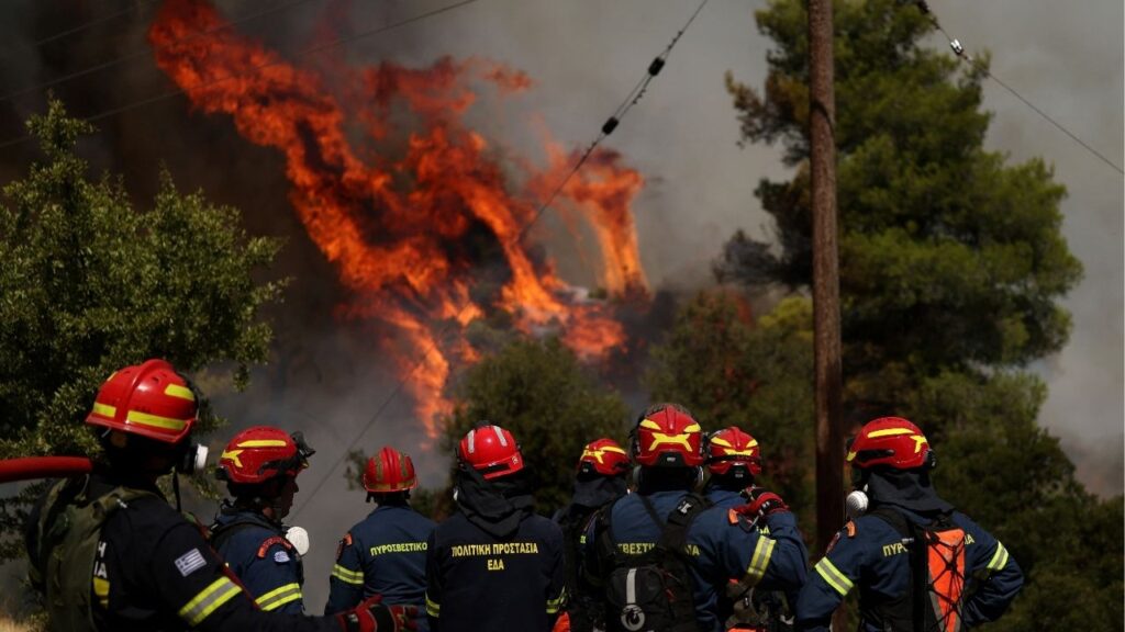 Firefighters battle wildfire near the village Agia Paraskevi, Greece, August 2, 2026. (Reuters/Stelios Misinas)