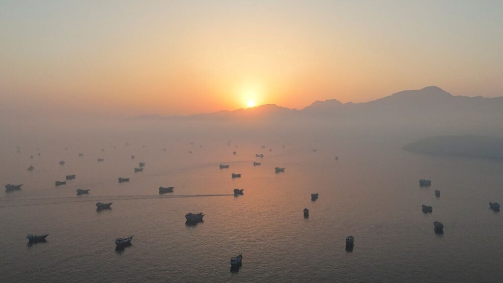 A drone view shows vessels in the Strait of Hormuz, as seen from Musandam, Oman, June 15, 2026. (REUTERS/Stringer/File Photo)