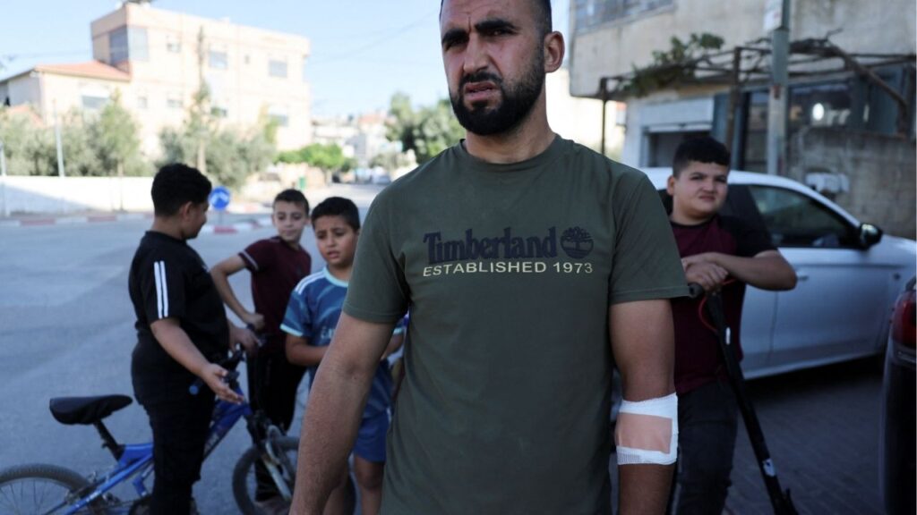Luay Bayrudi, the owner of a house that came under settler attack, outside of the medical center in Qusra, in the Israeli-occupied West Bank, August 29, 2026. Reuters/Ammar Awad