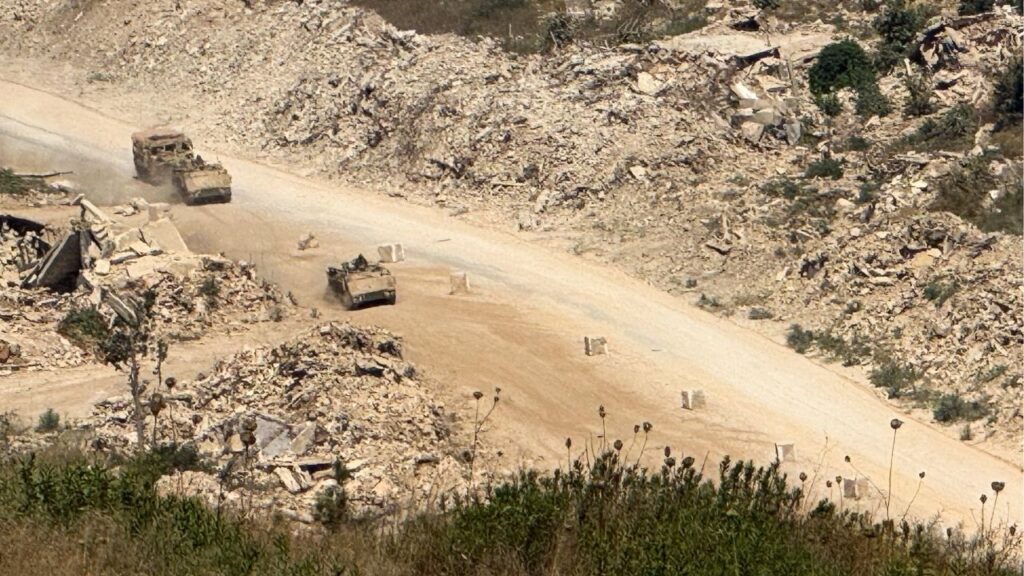 Israeli vehicles drive on a road in southern Lebanon, as seen from the Israeli side of the Israel-Lebanon border, in northern Israel, August 6, 2026. Picture taken with a mobile phone. REUTERS/Avi Ohayon