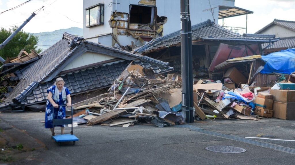 Collapsed homes in Yatsushiro, Japan, the city near the epicenter of Tuesday’s magnitude-6.8 earthquake that left at least 36 dead, on Friday, July 31, 2026. Kumamoto Prefecture faces a ‘double disaster’ of relief efforts amid muggy 100-degree heat, with limited air conditioning in shelters leaving many of the displaced at risk of heatstroke. (Chang W. Lee/The New York Times)