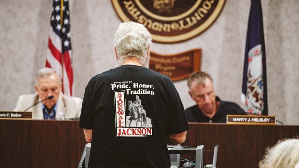 Public comment during the Shenandoah County School Board meeting where members voted, by virtue of a 3-3 tie, to not restore a high school’s and an elementary’s former Confederate names, in Quicksburg, Va., June 9, 2022. A federal judge has ordered a Virginia school board to again remove the names of three Confederate officers from two of its schools, after determining the board violated the civil rights of its Black students. (Eze Amos/The New York Times)