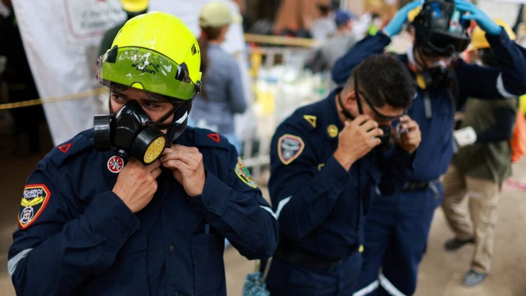 Members of the rescue team from Colombia work at the site of the Limonar Tower, which collapsed during Monday’s earthquake in Cali, Colombia, August 15, 2026. REUTERS/Raquel Cunha