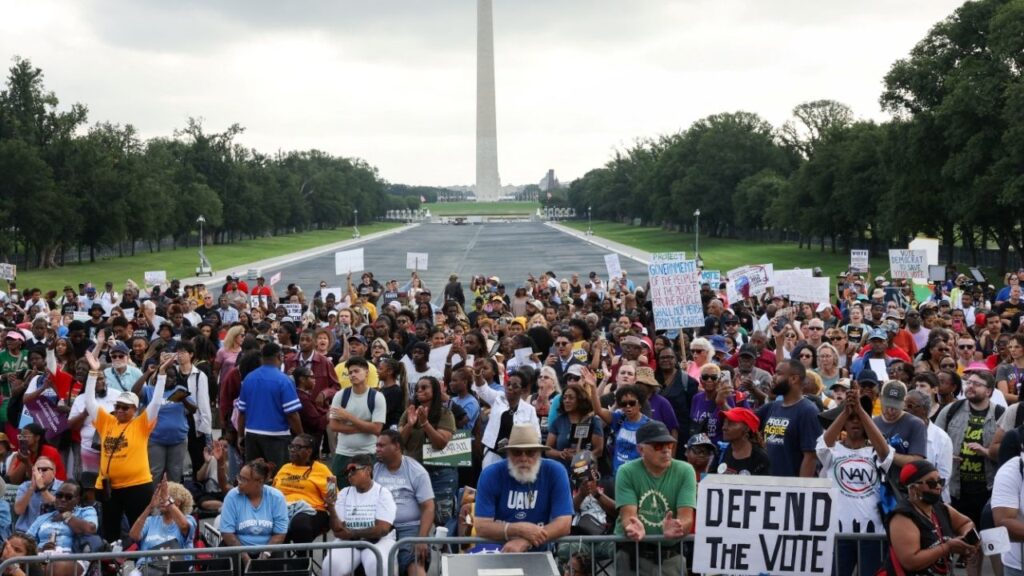 People attend the "March on Washington 2026: Defend the Vote" rally and march for voting rights, at the Lincoln Memorial in Washington D.C., U.S., August 28, 2026. REUTERS/Leah Millis