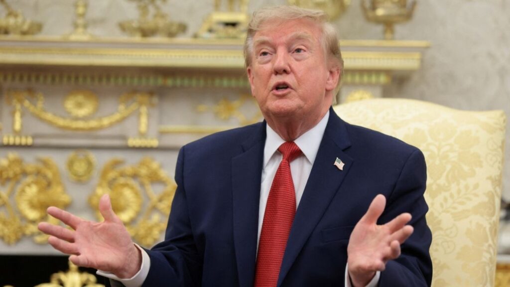 President Donald Trump speaks as he hosts 16-year-old lifeguard Ryder Williams, who saved a child off the coast of Santa Cruz, California, last month, Nathaniel Rai, the child saved by Williams, and Nathaniel's family members in the Oval Office at the White House in Washington, D.C., U.S., August 17, 2026. (Reuters/Kylie Cooper)