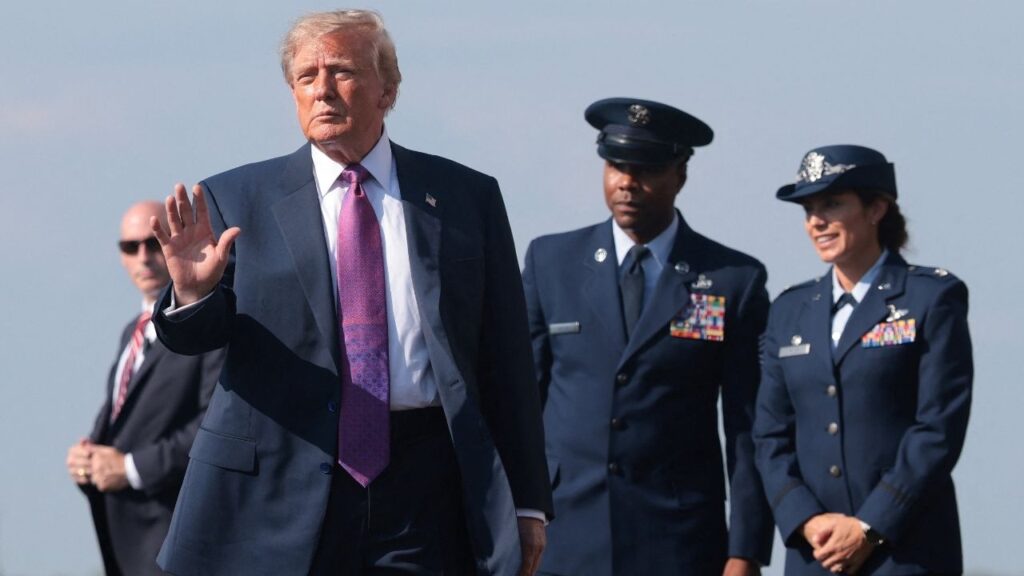 President Donald Trump waves to supporters after disembarking Air Force One at Ellington Field Joint Reserve Base in Houston, Texas, U.S., August 27, 2026. REUTERS/Kylie Cooper