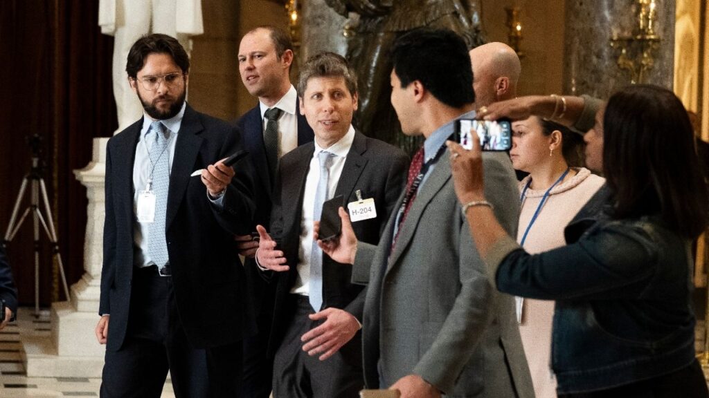 Sam Altman, the chief executive of OpenAI, speaks to reporters on Capitol Hill in Washington, June 3, 2026. Altman has joined more than 100 tech companies in publishing an open letter warning of a wave of cyberattacks driven by artificial intelligence. (Haiyun Jiang/The New York Times)