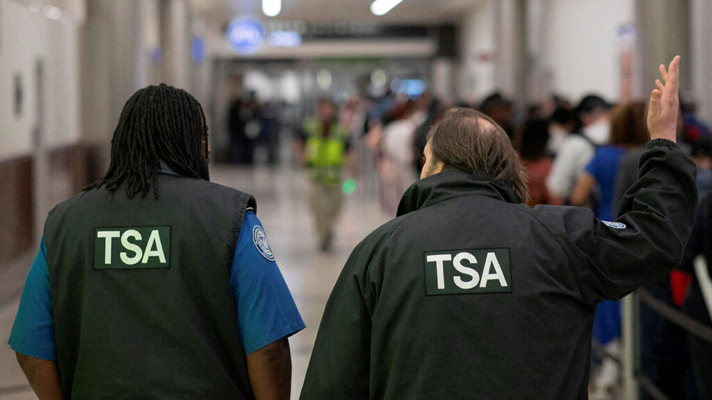 Transportation Security Administration (TSA) officers walk through the domestic terminal at Hartsfield-Jackson Atlanta International Airport in Atlanta, Georgia, U.S. March 27, 2026. (Reuters/Alyssa Pointer)