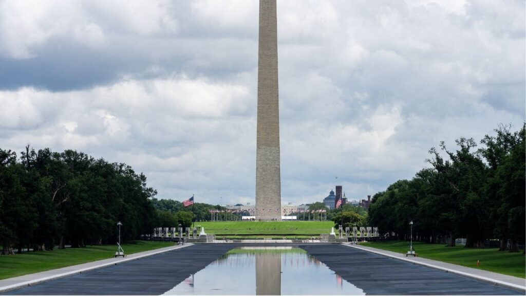 The Washington Monument is reflected in rainwater in the Lincoln Memorial Reflecting Pool in Washington, D.C., U.S., August 5, 2026. (Reuters/Eric Lee)