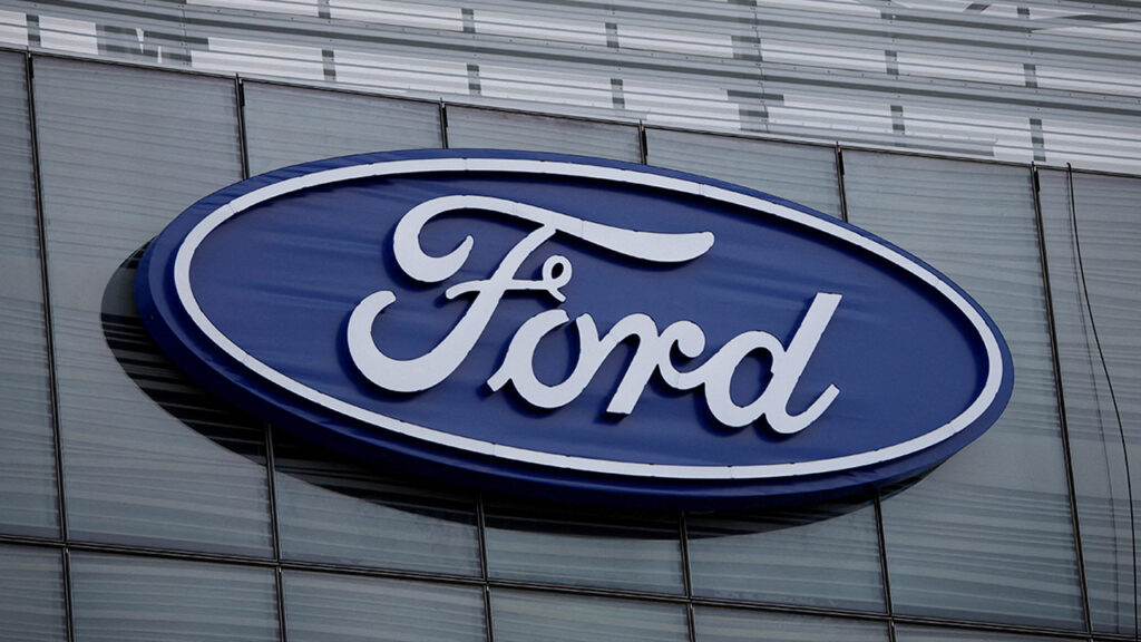 The blue Ford oval logo is displayed on the new Ford World Headquarters in Dearborn, Michigan