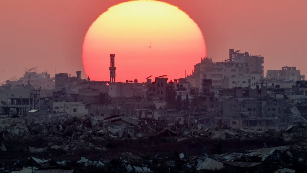 The sun sets over Gaza, as seen from the Israeli side of the border, August 2, 2026. (Reuters/Amir Cohen)