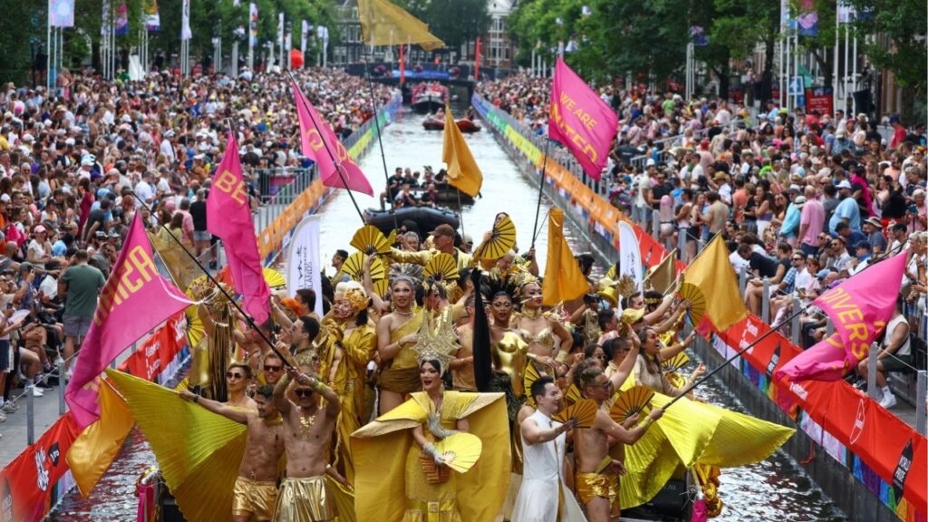 A boat filled with participants cruises the World Heritage canals during the annual Canal Parade at WorldPride in Amsterdam, Netherlands, August 1, 2026. Reuters/Thilo Schmuelgen
