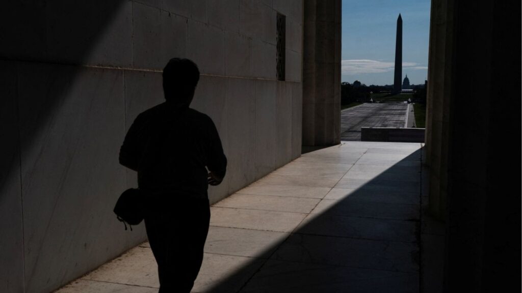 A visitor to the Lincoln Memorial walks near the drained Reflecting Pool, following renovations and Independence Day celebrations, in Washington, D.C., U.S., July 30, 2026. Reuters/Nathan Howard