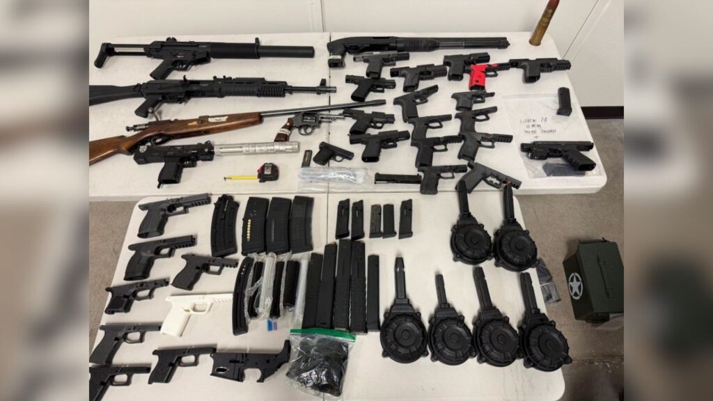 Two men were arrested after Madera County sheriff’s detectives said they found assault weapons, privately manufactured firearms, suppressors, about 100 firearm conversion devices and suspected cocaine during a search. (Madera County SO)