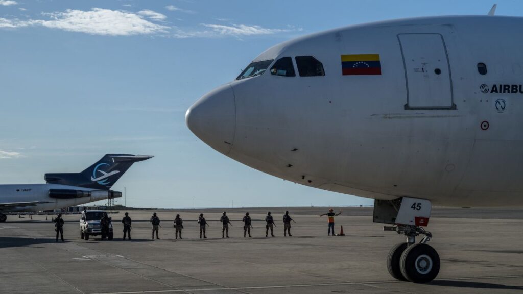 A Venezuelan-operated plane arrives with deported migrants at Simon Bolivar International Airport in Maiquetía, Venezuela, Dec. 3, 2025. The United States sent a flight with deportees to Venezuela on Monday, August. 3, 2026, for the first time since devastating earthquakes struck the South American nation in late June. (Alejandro Cegarra/The New York Times)