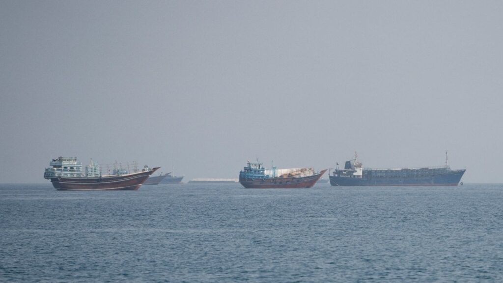 Vessels near the Strait of Hormuz, as seen from Musandam, Oman, August 24, 2026. REUTERS/Stringer