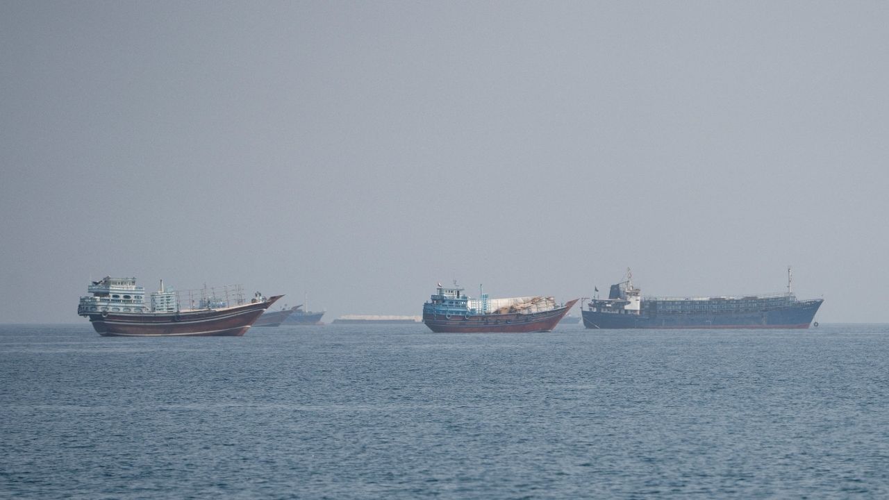 Vessels near the Strait of Hormuz, as seen from Musandam, Oman, August 24, 2026. REUTERS/Stringer