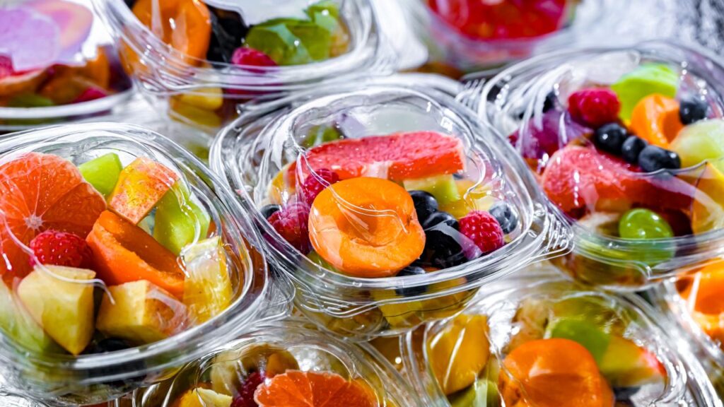 Image of fresh fruit in non-recyclable plastic packaging