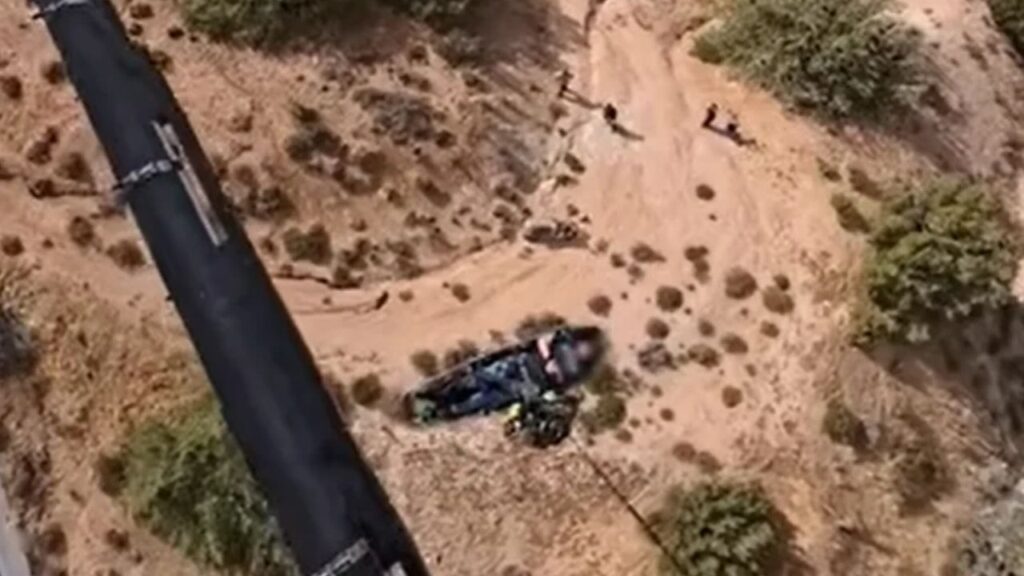 A Kern County sheriff’s helicopter hoisted an injured motorcycle rider from remote terrain northeast of Sand Canyon on Sunday. (Video Screengrab/Kern County SO)