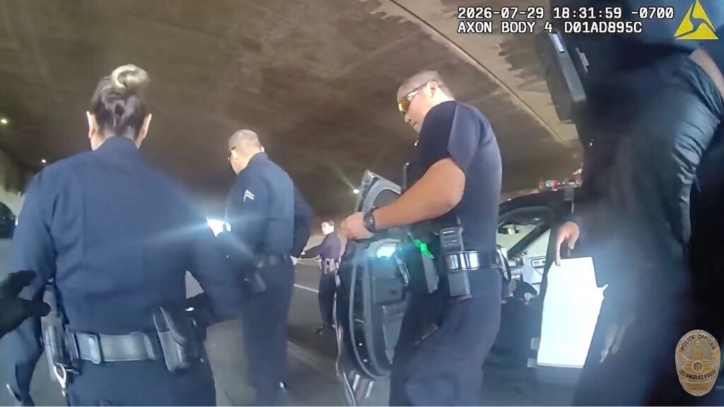 A photo provided by the Los Angeles Police Department shows footage of officers fatally shooting Alejandro Luis Garcia, who was reported to be swinging an aluminum baseball bat at pedestrians, on July 29, 2026. Mayor Karen Bass questioned police training to handle mental health crises after the city released graphic video footage of officers’ actions. (Los Angeles Police Department via The New York Times)