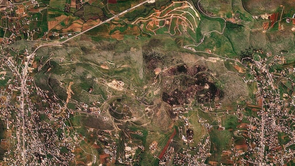 A satellite image shows damage at the Ali al-Taher ridge near Nabatiah, Lebanon, March 8, 2026. 2026 Planet Labs PBC/Handout via REUTERS
