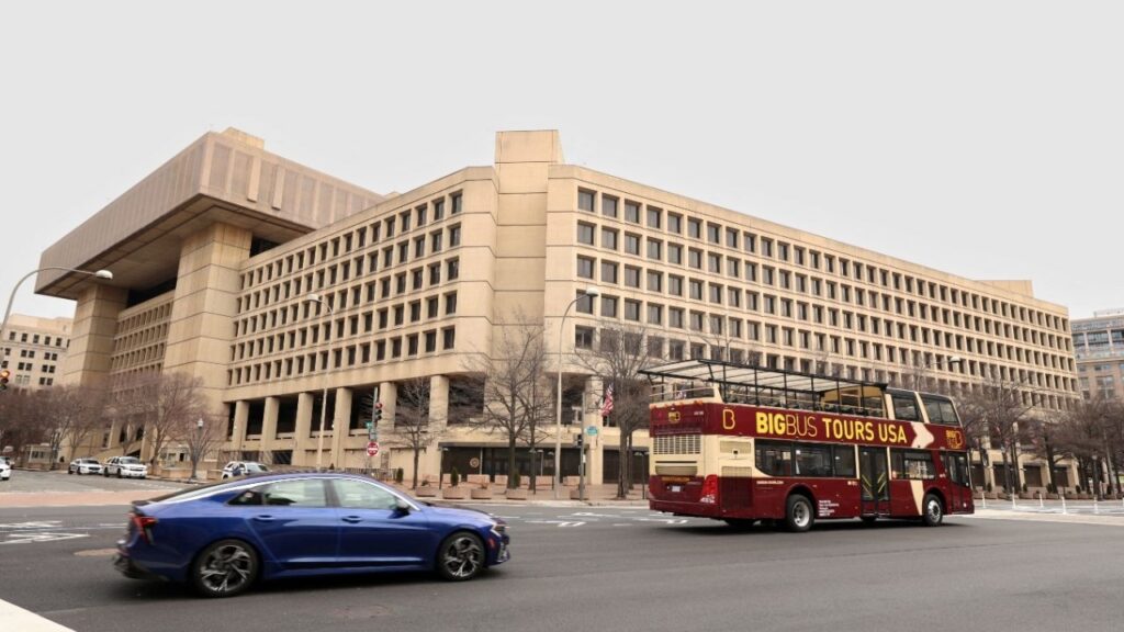 A tour bus drives past the FBI headquarters in Washington, U.S., February 3, 2025. (Reuters File)