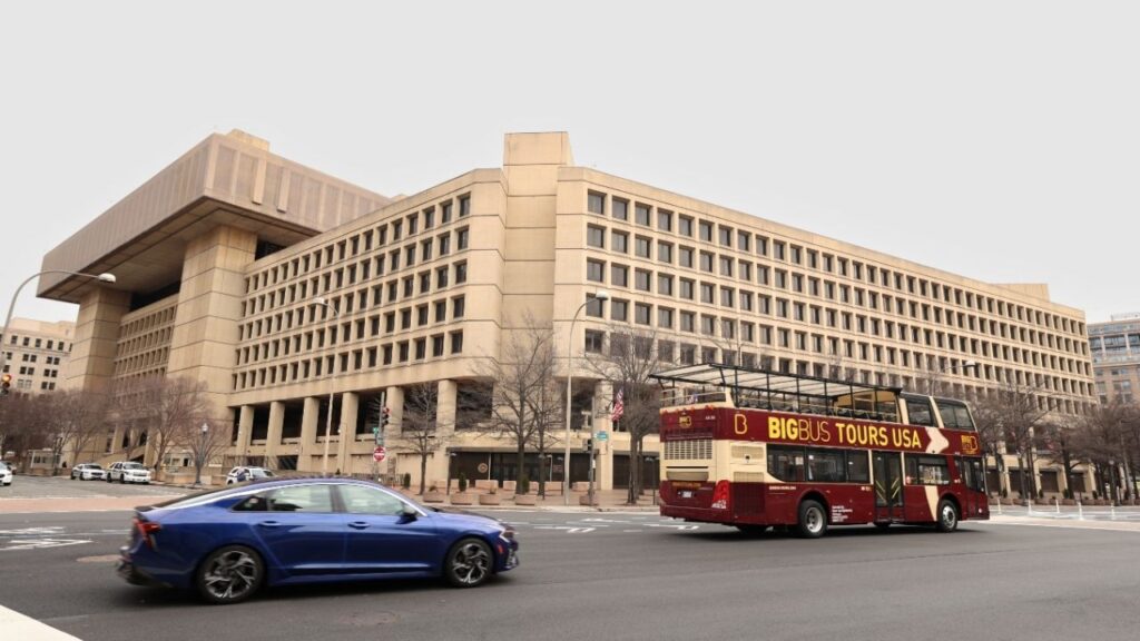 A tour bus drives past the FBI headquarters in Washington, U.S., February 3, 2025. (Reuters File)