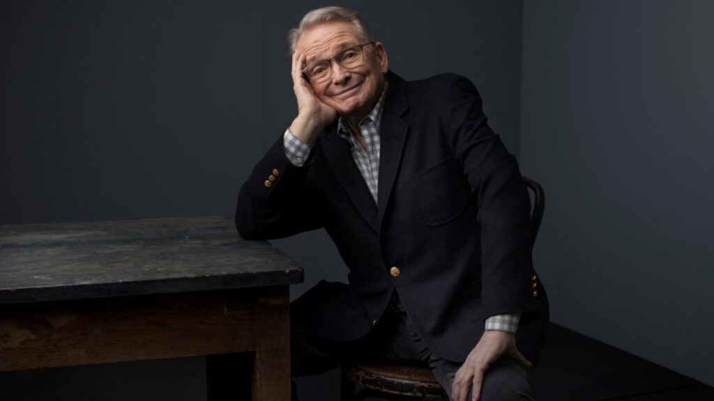 Bob Mackie in Manhattan, May 1, 2019. Mackie, the exuberant costume and fashion designer whose creations bedecked, bedazzled and elevated performers, most memorably and enduringly, Cher — as well as an 11½-inch model named Barbie — died on Monday, Sept. 14, 2026, in Palm Springs, Calif. He was 87. (Celeste Sloman/The New York Times)