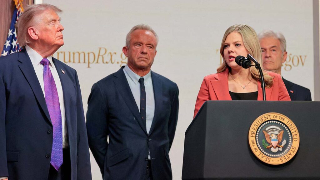 Centre for Medicare & Medicaid Services Administrator Dr Mehmet Oz, U.S. Health and Human Services Secretary Robert F. Kennedy Jr., and U.S. President Donald Trump stand as Heidi Overton speaks during an event to deliver remarks about health care costs and affordability from an auditorium on the White House campus in Washington, D.C., U.S., May 18, 2026. (Reuters/File Photo)