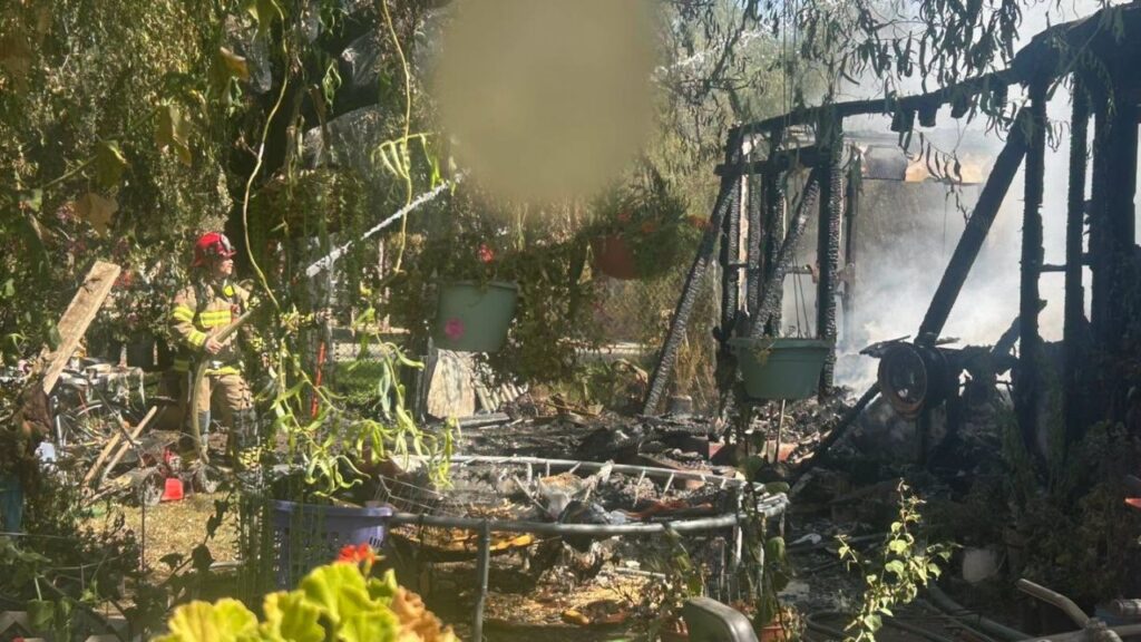 Firefighters responded to a heavily involved residential fire Thursday near Road 152 and Avenue 296, with no injuries reported. (Tulare County FD)