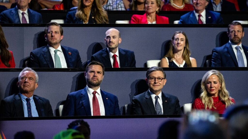 From left: Health Secretary Robert F. Kennedy Jr., Vice President JD Vance and House Speaker Mike Johnson (R-La.) listen as President Donald Trump speaks at the Republican Party’s midterm convention in Dallas on Wednesday night, Sept. 9, 2026. When Trump took the stage, he returned — again and again and again — to baseless claims that Democrats were running as communists in the midterms. (Haiyun Jiang/The New York Times)