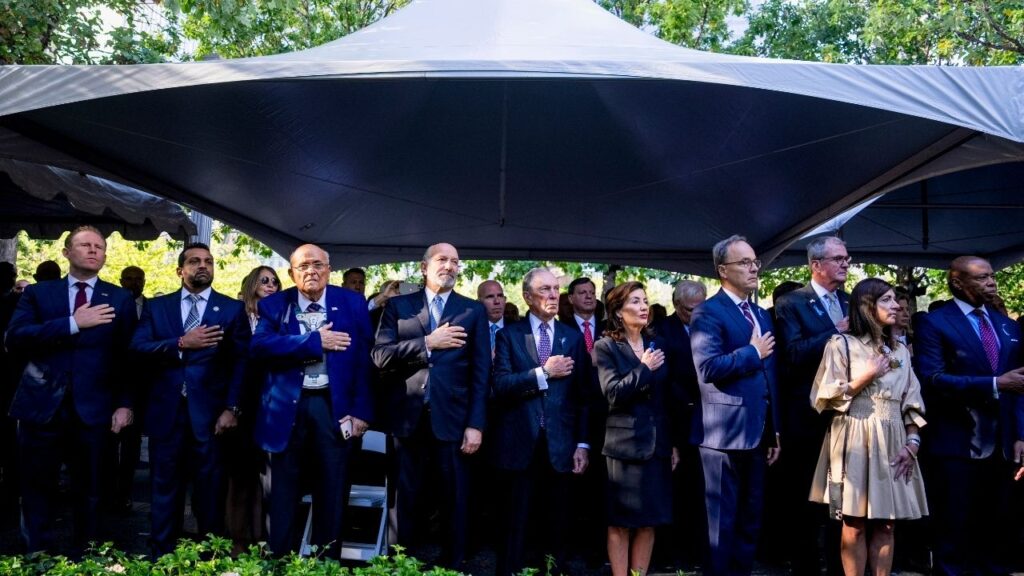 Front row from left: Andrew Giuliani; FBI Director Kash Patel; former New York Mayor Rudy Giuliani; Commerce Secretary Howard Howard Lutnick; former Mayor Michael Bloomberg of New York; Gov. Kathy Hochul of New York and her husband, William Hochul Jr.; New Jersey Gov. Phil Murphy and his wife, Tammy Murphy; and New York Mayor Eric Adams. (The New York Times Company)