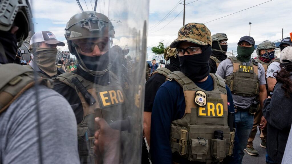 ICE agents gather outside Delaney Hall in Newark, N.J., May 28, 2026. Immigration and Customs Enforcement is preparing for a massive hiring surge, with a goal of bringing on 5,000 new officers by the end of the year, according to four people familiar with the plans. (Todd Heisler/The New York Times)