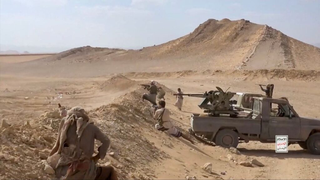 Iran-aligned Houthi fighters fire from their position in a screengrab from a video said to show Houthi fighters attacking Saudi-backed forces in the location given by the source as al Jawf governorate, Yemen, in this screengrab taken from a video released by Houthi Military Media on September 15, 2026. HOUTHI MILITARY MEDIA/Handout via REUTERS