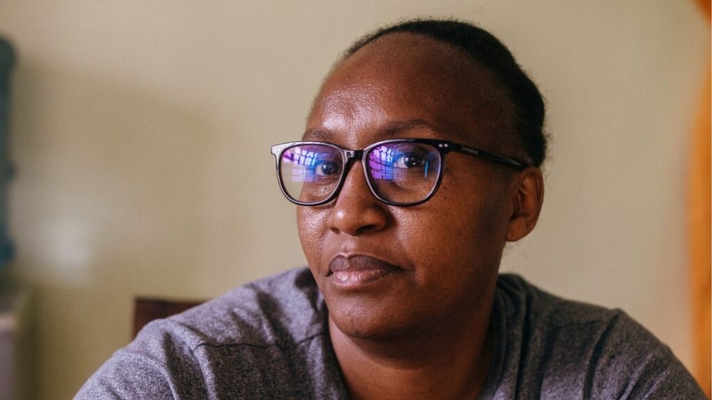 Frida Mwangi, a labor activist representing outsourcing workers who used to do online gig work providing transcription, in Nairobi, Kenya, June 30, 2026. Thousands of Kenyans made a living writing essays for overseas students, but AI has dried up that work — a warning for online gig workers across the world. (Kang-Chun Cheng/The New York Times)