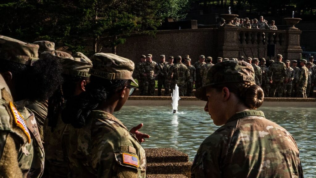 Military troops attend a ceremony with Defense Secretary Pete Hegseth at Meridian Hill Park in Washington, July 2, 2026. The number of National Guard soldiers on the streets of Washington has fallen to 2,921, according to a Pentagon task force in the city, down from a peak of 5,148 troops on July 10. (Alex Kent/The New York Times)