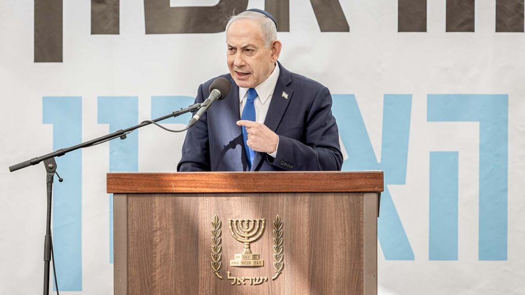 Prime Minister Benjamin Netanyahu speaks at a funeral in Meitar, Israel on Jan. 28, 2026. Netanyahu is up for re-election in October, but is trailing in the polls. Now, he is openly trying to turn regional tensions to his political advantage. (Avishag Shaar-Yashuv/The New York Times)