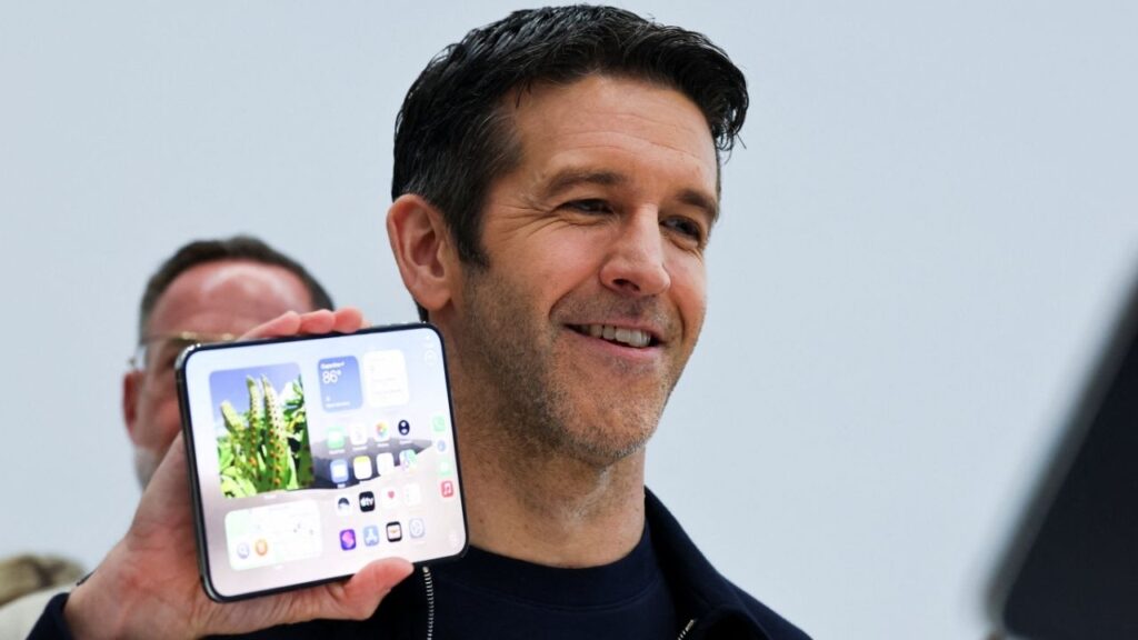 New Apple CEO John Ternus holds the new foldable iPhone Duo during Apple's event at the Steve Jobs Theater in Cupertino, California, U.S. September 9, 2026. REUTERS/Carlos Barria