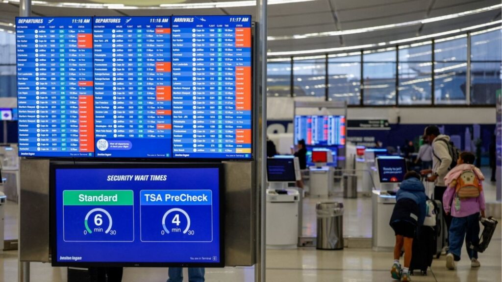 A traveler with children walks near an information board at Boston Logan International Airport, which shows cancelled flights as a strong nor'easter coastal storm batters the US northeast coast, in Boston, Massachusetts, US, September 26, 2026. Reuters/CJ Gunther TPX IMAGES OF THE DAY