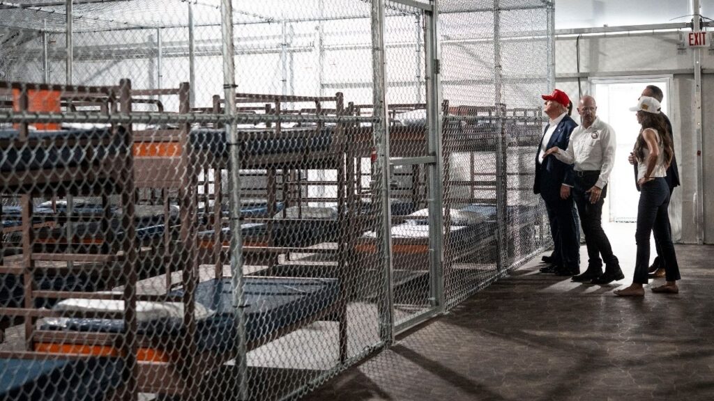 President Donald Trump tours the immigration detention center known as Alligator Alcatraz in Ochopee, Fla., July 1, 2025. The state-run immigration detention center in the Florida Everglades failed to comply with a host of federal detention standards, creating cramped conditions and confining migrants in “small metal enclosures,” according to a new report by the Department of Homeland Security’s independent watchdog. (Doug Mills/The New York Times)